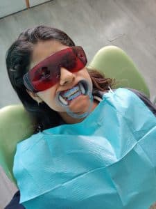 The patient is prepared, taking all necessary precautions, for the teeth whitening procedure.
